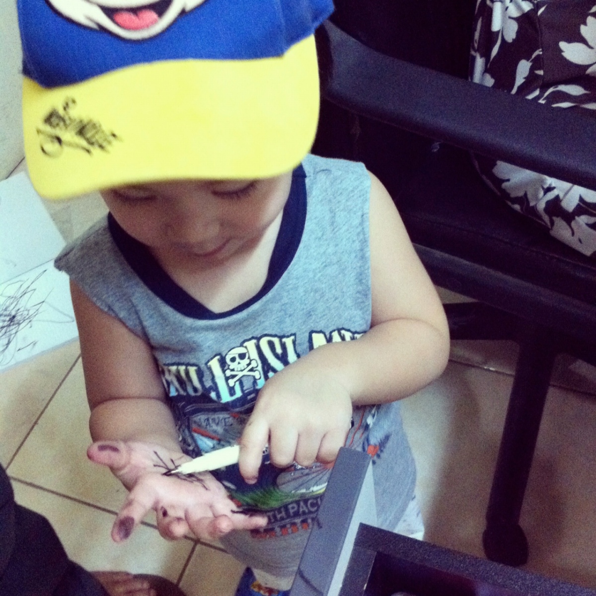 See! How kulit  you are, Liam. You write on your hand, then you'll say, Yuck!! showing us your dirty hands.  Buti na lang at cute ka anak! :)